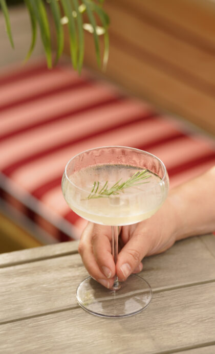 Woman holding a cocktail