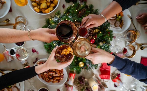 Christmas Feast, People Cheering over a festive table